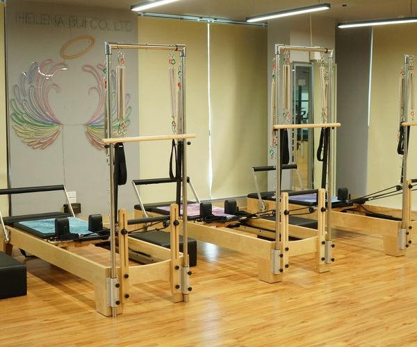 Clean and bright fitness studio with modern equipment and a calm atmosphere.